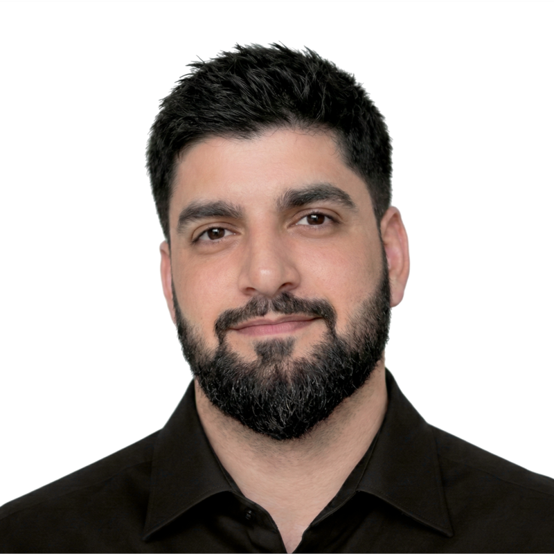 Headshot of Tajamul Khan in a black shirt